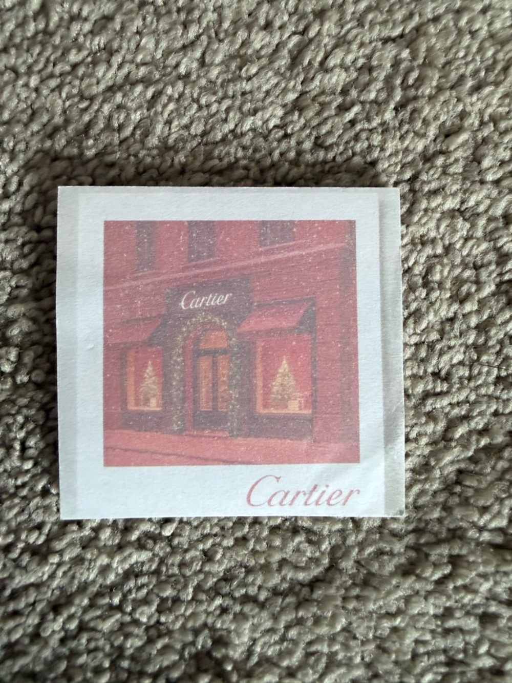 Cartier red and white storefront sticky note